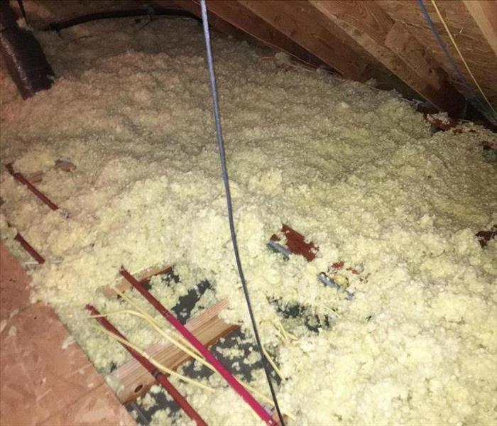 Wet insulation in attic due to pipe bursting